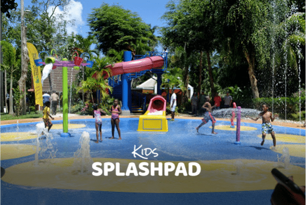 Splash Pad at Dunn's River Falls in Jamaica with kids playing in the water