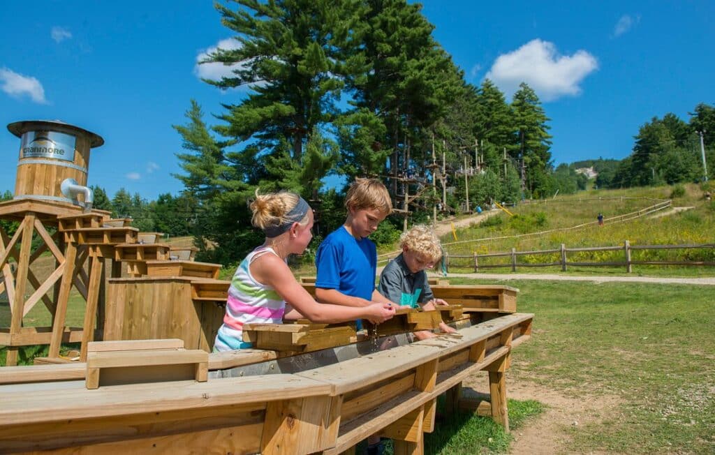 New England Family Vacation - kids practice their mining skills at Cranmore Mountain