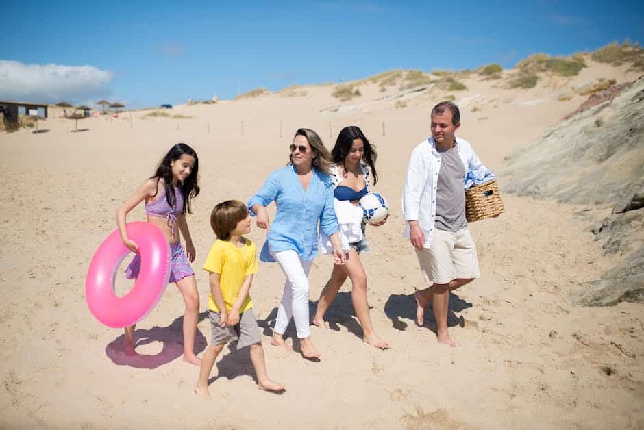 A family walking on the beach along the East Coast Vacation destination